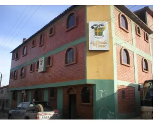 Figure 1: A captioned scene from CLEF IAPR TC-12dataset: There is a car in front of the house on the left.visual models, therefore, such models need to betrained on external datasets and later incorporatedin our multi-modal setting, 2) Aligning text enti-t