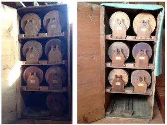 Figure 2.8 - Cases containing spaces to fit 16 barrels for the Holland organ. The barrels have slightly different diameters which allow for a fractionally longer or shorter playing barrel