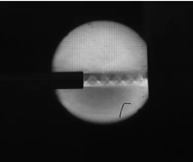 Figure 11 Shock Diamonds in Supersonic Flow Exiting a Straight Nozzle 