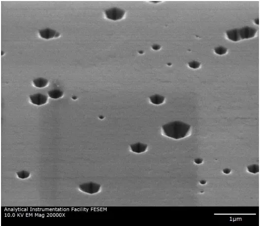 Figure 3.4 SEM image of the surface of a thick InxGa1-xN layer undergoing elastic relaxation by forming surface V-pits