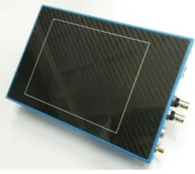 Figure 1-26 X-ray detector utilized to acquire X-ray images during tomographies. The front surface shows the carbon fibre window that seals and protects the active scintillator area