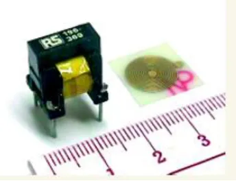 Figure 2.1: Photograph of a coreless PCB transformer (right) and   a core-based transformer (left)  