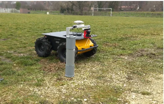Figure 10. All-terrain mobile platform running ASAWoO next to the base station kit