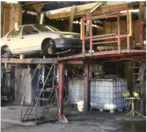 Figure 4 Elevated fluid draining station at Standard Auto Wreckers 