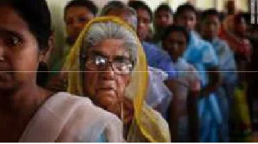 Fig. 1:  Old & aged person standing in a long vote queue waiting for her turn 