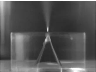 Figure 3 shows a photograph of near incipient cavitation occurring in the receiver, using a conical nozzle