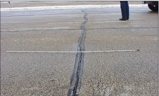 Figure 13: Thermal Cracking on Taxiway-E at Greater Peoria Regional Airport  A hybrid reflective crack relief system was design for the GPRA to accommodate larger  reinforcement width and enhance base isolation benefits