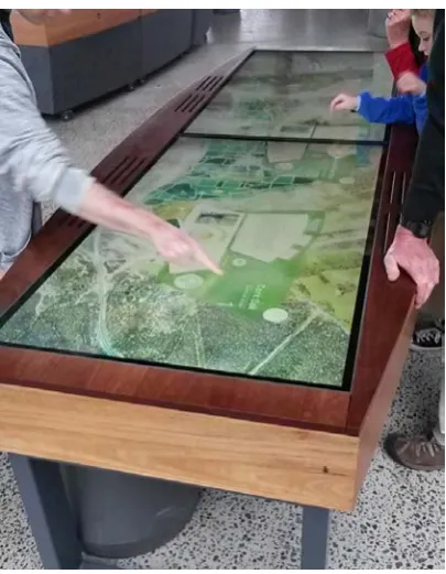 Figure 1.2: Interactive Touch Table at the National Arboretum, Canberra Australia. Userscan select locations on the map to view additional information and rich media.