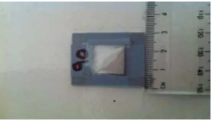 Figure 2 Dosimeter with polysulphone and phenothiazine films and a Llumar filter 