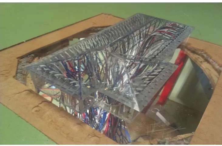 Figure 7.1. 1/50 scale wind tunnel model of representative contemporary house 