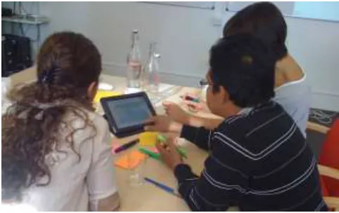 Figure 5: Participants interacting with the information visualization during Activity 2 