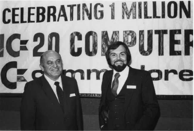 Fig. 1.6  Jack Tramiel  (left) and Michael Tomczyk celebrating the one millionth VIC-20 sold