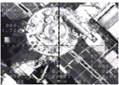 Figure 3.  A photo of the Crew Optical Alignment Sight (COAS) graphical overlay.  This instrument is used routinely for docking maneuvers on the Space Station and Shuttle