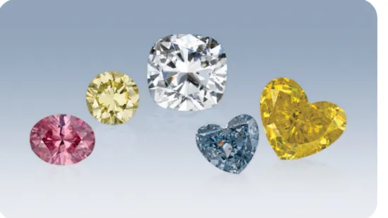 Figure 1. Gem diamonds such as these are prime examples of their  respec-tive diamond types (from left): 0.47 ct type Ia pink, 0.38 ct type Ia