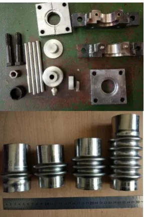 Figure 1.  The die set and some of the metallic bellows manufactured by the hydroforming process  