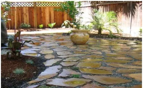 Figure 8 : An urbanite patio stained with iron sulphate (Source: Terra Nova Ecological Landscaping, 2013)