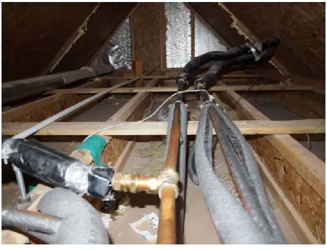 Figure 4. Solar system pipework in the attic of the Glasgow house showing poor 