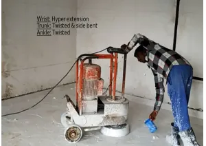 Figure 4: Worker applying veneer in awkward body posture.   