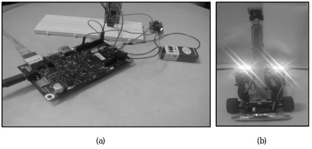 Fig. 3. Hardware setup (a) Intel Edison with temperature, humidity and water sensors (b) Agro automation bot 