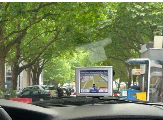 Figure 1.2-1: Embedded in-vehicle navigation unit (from BMWTM) 