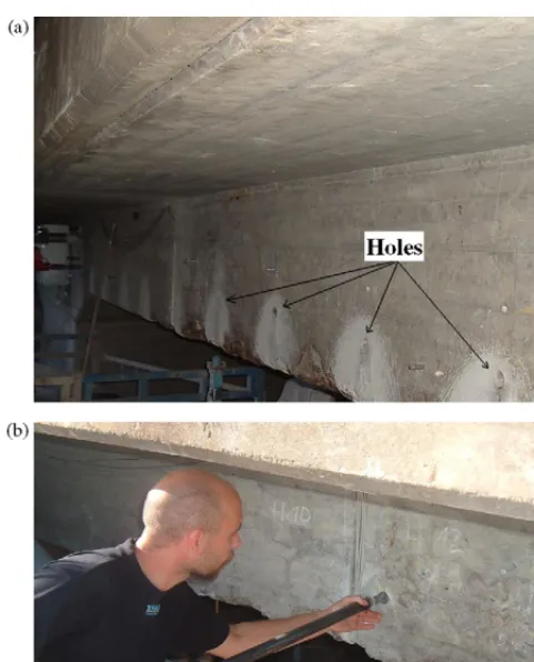 Fig. 3. (a) Holes grilled into the bridge; (b) inserting the tubes into the structure.