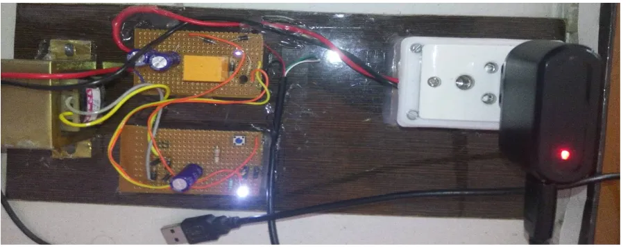 Figure 4.1 represent the completed system of automatic USB controlled power switch. It is demonstrated as connecting a USB charger with a red LED to indicate the output supply