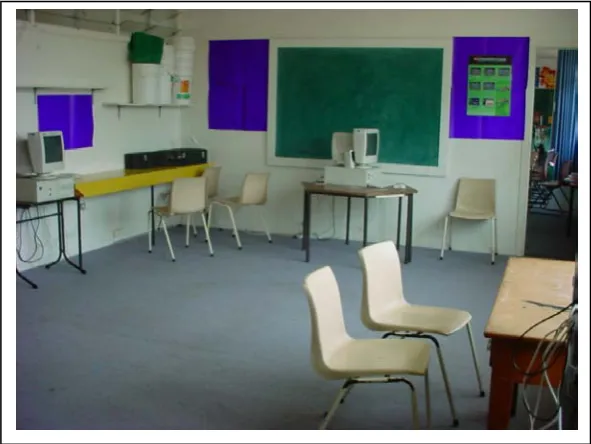 Figure 3.1 Robotics laboratory showing three of six stand-alone computers (left, centre and right) 