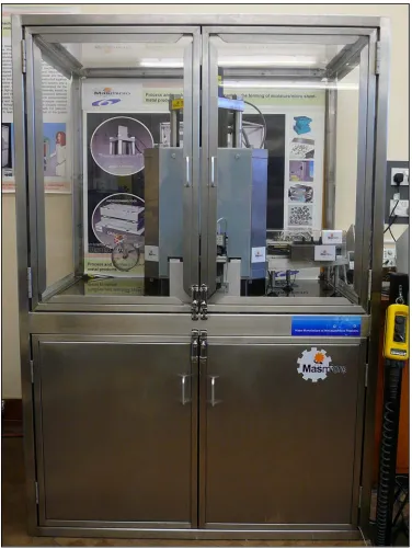 Fig. 4 The micro-sheet-forming machine system developed by the University of Strathclyde and partners 