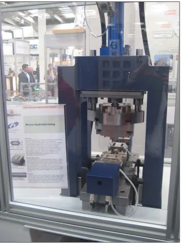 Fig. 5 The micro-hydro-forming machine system developed by the University of Applied Science Cologne and partners 