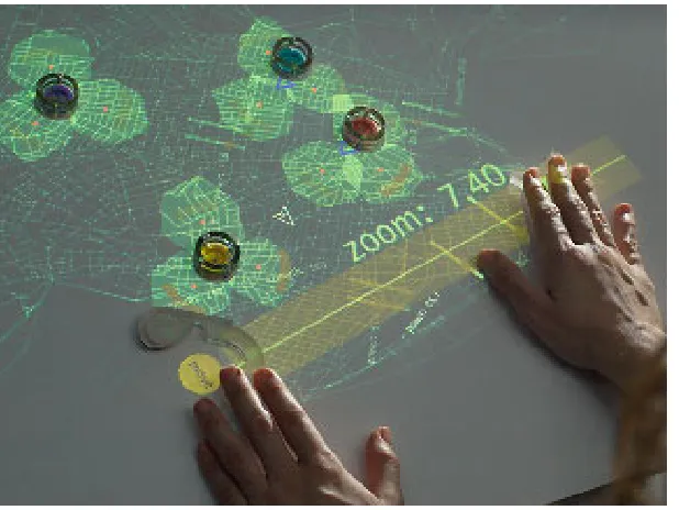 Fig. 4.5 Pico [181] is an interactive surface that supports solving complex spatial layoutproblems through improvization, Pico allows users to employ everyday physical objects asinterface elements that serve as mechanical constraints within the problem space (Photocourtesy: James Patten).