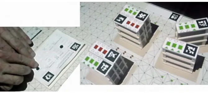 Fig. 4.6 Tinkersheets [267] supports learning about warehouse logistics and enables users toset simulation parameters through interaction with paper forms where small black magnetsare placed onto parameter slots (photo: E