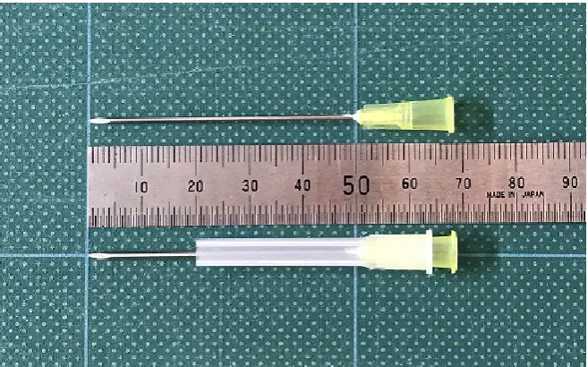Figure 1. Injection needles use in this study. Upper: The RLAI-specialized 20 gauge in-jection needle, 50 mm (2 inches) in length