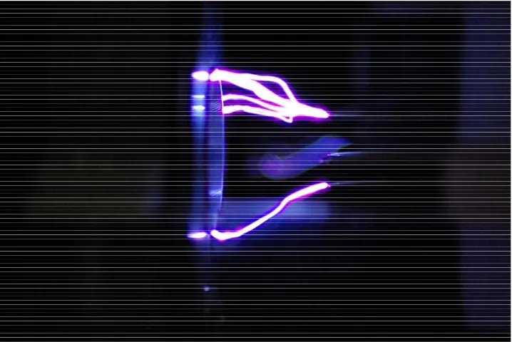Figure 2.4 Photograph of arcing between needle and ring on an ionic air moving device