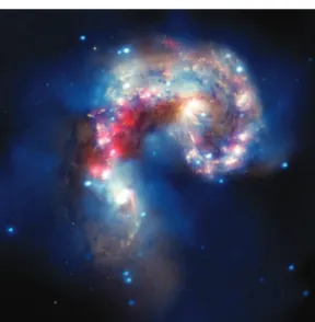 Figure 10  Gravity controls the collision of two clusters of galaxies, while electricity and magnetism  affect the release of radiation during the collision. (Colours have been added to the image to  enhance the visual representation.)