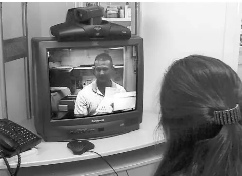 Figure 4. Patient counseling by pharmacist using videoconferencing. 