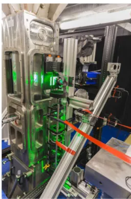 Fig. 4    Laser volume illumination of particles in the flow around the  surface mounted glass cube as viewed through six-folded prism (a)