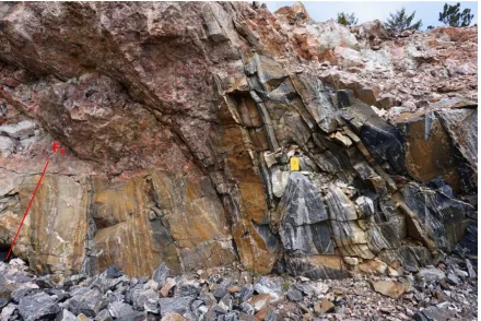 Figure 1-5. Isoclinal F4 fold overprinting isoclinal F1/2 in Wanapitei country rock. Solid lines indicate axial trace
