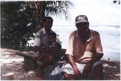 Figure 1.11: Eddy Tanfa with his daughter Elizabeth and uncle Samson Sie