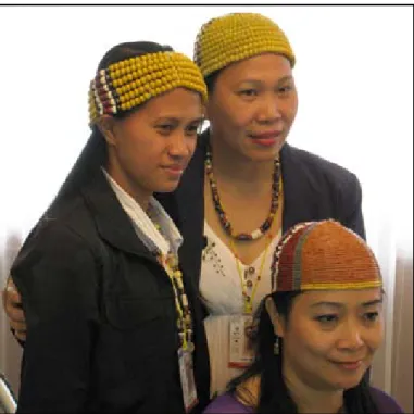Figure 1. Some of the ladies at the bead identification  table with their distinctive beaded caps