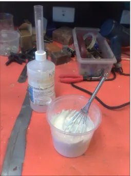 Figure 11: Mixing the resin, glass powder & MEKP. 