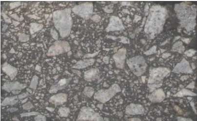 Figure 11.  Vertically sliced Marshall hammer compacted specimen  