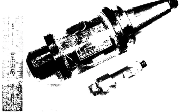 Figure 2.1: Smart Tool Holder (top) and sensor integrated cutting tool (bottom)  2.3 Design Description 