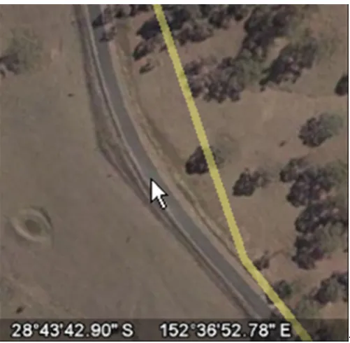 Figure 3.5 – Cursor on Road in Google Earth with Coordinates Displayed at Bottom of Screen.