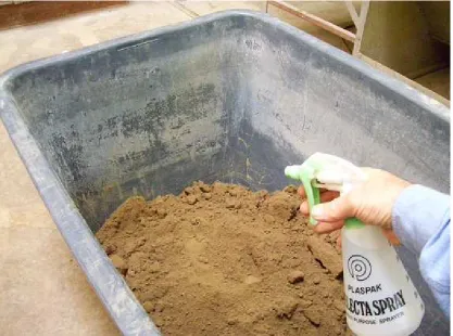 Figure 6.4 Application of Water to Soil Sample in 200litre Tub 