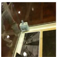 Figure 8. Relatively large logger (an old device) for temperature and humidity placing inside a sealed show case