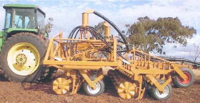 Figure 1.1: Image of a three point linkage planter fitted to a tractor