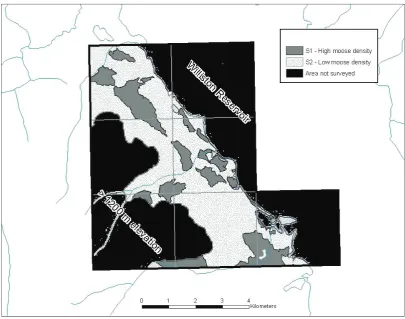 Fig. 1.  An example of a high moose population density stratum sample unit (S1; all dark gray polygons combined) and a low moose population density stratum sample unit (S2; all stippled area) where 7 adjacent grid cells were amalgamated to form an area wit