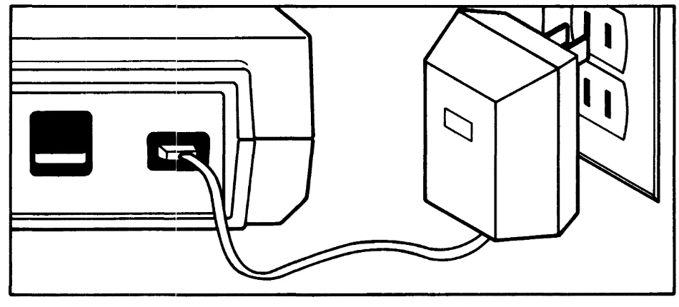 Figure 2 - 2. Connecting the Adapter/Recharger 