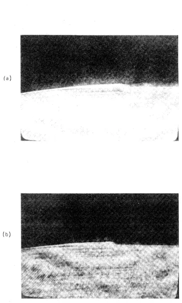 Fig. 2.22. Two zone images of the 'same hologram displaying the separation on the hemispherical body (u.:n = 23