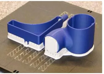 Figure 2. “Models made with FDM (grey support material can be seen)”. 